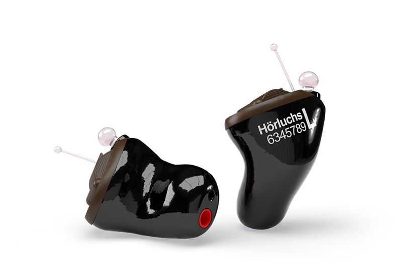 Zwei schwarze Hörgeräte mit Antennen und Beschriftung Hörluchs auf weißem Hintergrund, modernes Gehörschutz-Design​​​​​​​​​​​​​​​​​​​​​​​​​​​​​​​