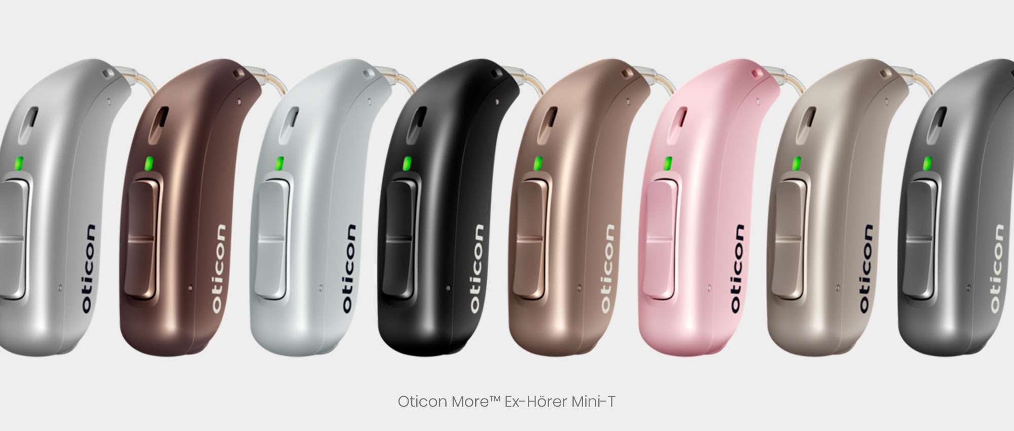 Mehrere Oticon More Mini-T Hörgeräte in verschiedenen Farben nebeneinander auf weißem Hintergrund​​​​​​​​​​​​​​​​​​​​​​​​​​​​​​​​​​​​​​​​​​​​​​​​